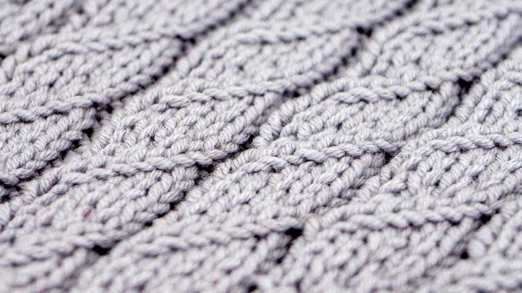 Close Up of the Pillar Spiral Cable Stitch Knitting Pattern
